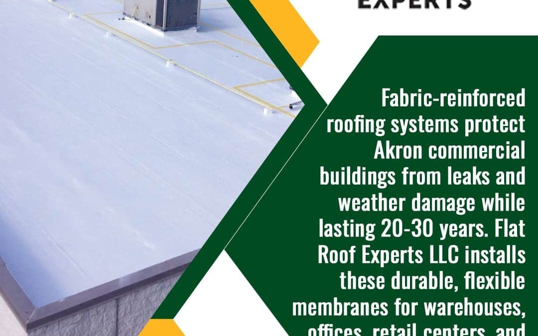 Description of fabric-reinforced roofing systems protecting Akron commercial buildings for 20-30 years, installed by Flat Roof Experts LLC. The image shows a wide view of a white fabric-reinforced flat roof with several HVAC units.